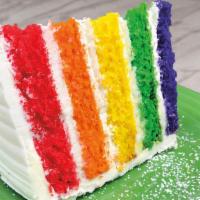 Rainbow Cake · A multi-colored marvel of five moist sponge layers and dreamy vanilla frosting.