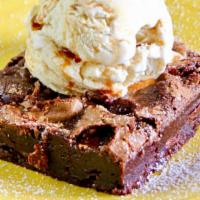 Sara'S Brownie Á La Mode · Rich, smooth chocolate brownie with marshmallows. Served warm, topped with one scoop of Mexi...