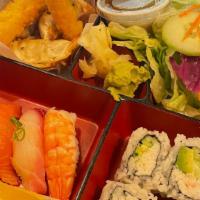 Sushi Bento Box · Served with 3 pieces of gyoza, 4 pieces of california roll, 2 shrimp tempuras, house salad, ...