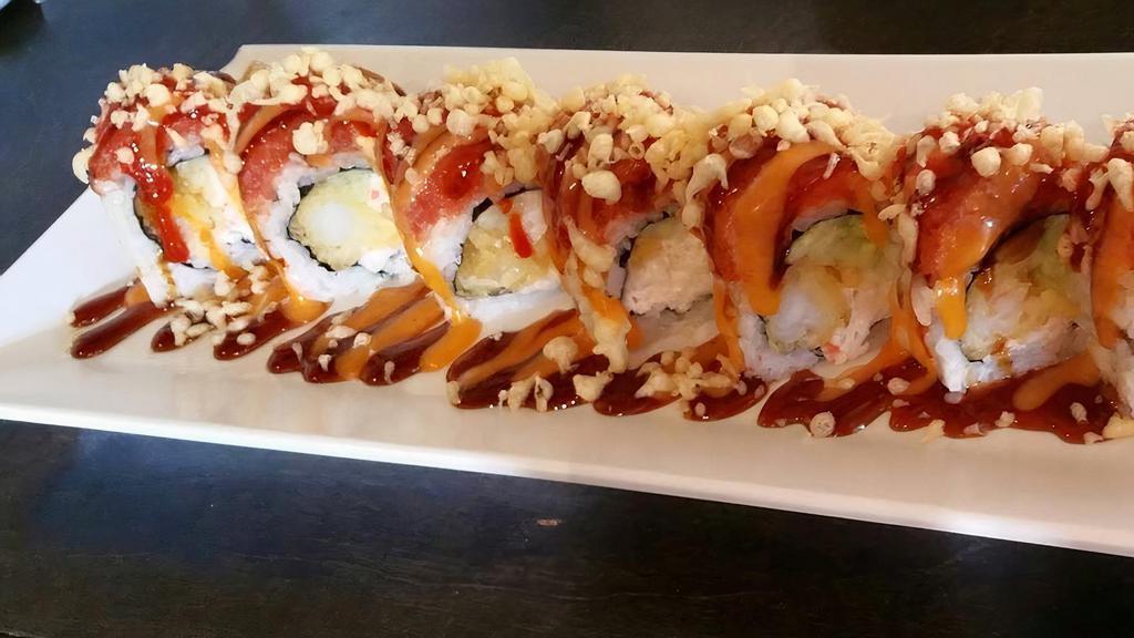 Spicy T. Crunch Roll · Spicy. Shrimp Tempura, Crabmeat, Cucumber, Topped With Spicy Tuna and Crunch Powder (Eel Sauce, Spicy Mayo, Sriracha)
