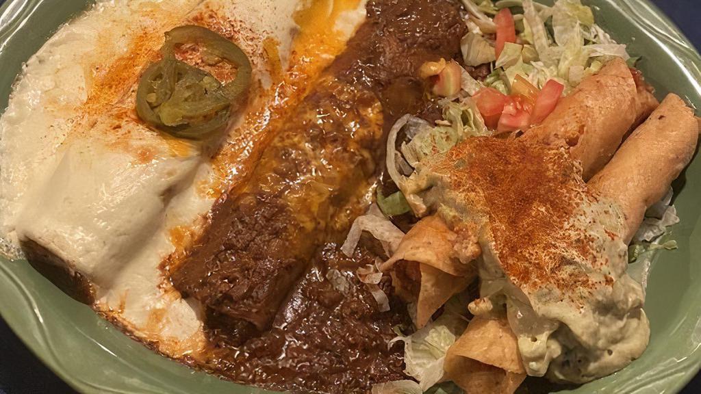 Plato De Maria · One chicken sour cream enchilada and one beef enchilada with chili con carne and chicken flautas with guaco-cream™dressing.