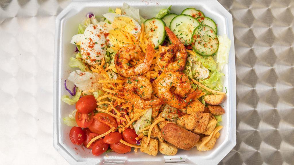 Fried Or Grilled Shrimp Salad · Blend of Romaine & Iceberg lettuce, cherry tomatoes, sliced cucumber, egg & shredded cheese, topped with fried shrimp covered with zesty grilled shrimp.