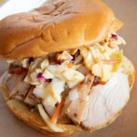 Chicken.W.A · Slow smoked natural chicken breast topped with mustard coleslaw, onions, dank white, backyar...