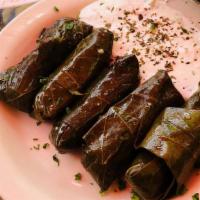 Grape Leaves · Gluten free. Stuffed with seasoned ground beef and rice served with tzatziki.