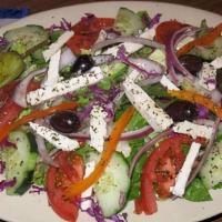 Greek Salad Large · Gluten free. Lettuce, onions, feta cheese, tomatoes and kalamata olives