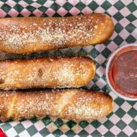 Pepperoni Rolls (3) · Three pepperoni rolls served with a side of ranch dressing or marinara sauce.