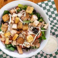 Marinated Chicken Salad · Grilled Chicken, tomatoes, black olives, and mozzarella cheese.