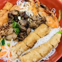 Vermicelli Fried Tofu · Thin Rice Noodles served with Lettuce, Cucumber, Bean Sprouts, Pickled Carrots, Sauteed Gree...
