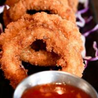 Crispy Squid · Deep fried batter dipped squid with sweet chili sauce.