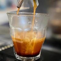 Espresso · Strong black coffee made by forcing hot water through finely ground coffee.