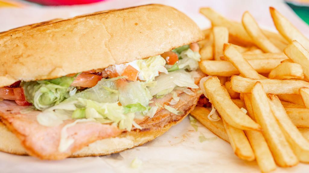 Torta With Fries · With meat, lettuce, tomato, guac, sour cream, beans.