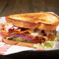 Sliced Turkey Sandwich · swiss, lettuce, tomato, onion, bacon, mayo
