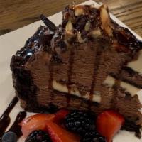 Chocolate Eruption · Chocolate cake, chocolate chunks, chocolate sauce, and fresh local berries.