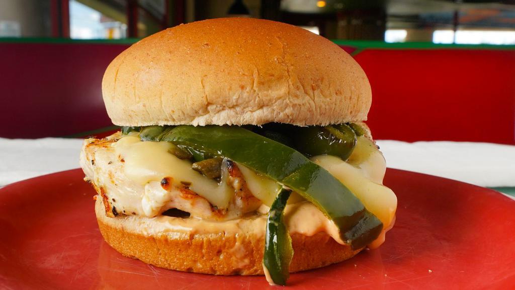 Roasted Poblano Chicken Sandwich · Grilled chicken breast on a wheat bun with roasted poblano peppers, pepper jack cheese, chipotle mayo & grilled onions