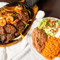 Parrilada Sonora · A combination plate with chicken, beef and shrimp
marinated and grilled, sautéed with onions...