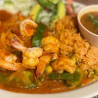 Camarones Ranchero /  · 7 jumbo shrimp sauteed in Ranchero sauce.
Served with Rice and salad.