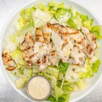 Chicken Caesar Salad · Chopped romaine lettuce tossed with fresh caesar dressing, shaved parmesan cheese, house-mad...