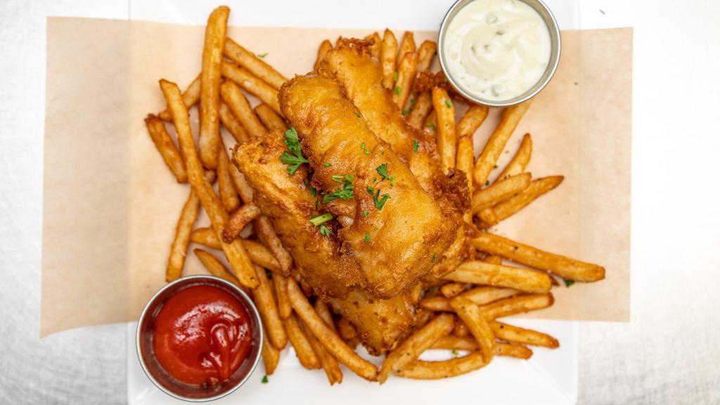 English Fish N Chips · Crispy cod served atop beer battered fries served with malt vinegar and house-made tartar sauce.