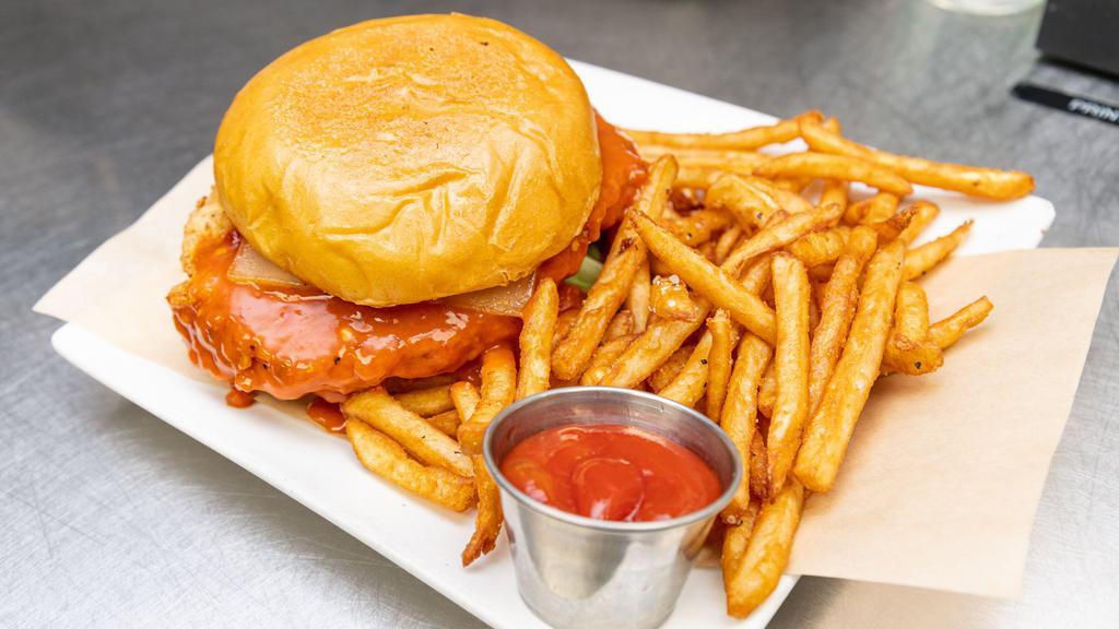 Buffalo Chicken Sandwich · Country fried chicken tossed in tavern buffalo sauce & topped with lettuce, tomato & Swiss cheese.