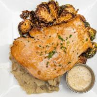 Atlantic Islands Salmon · Horseradish-crusted ocean farmed salmon served with garlic mashed potatoes & brussel sprouts.