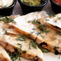 Chicken Quesadilla · Grilled chicken, roasted poblanos, Monterey jack & cheddar cheeses, hatch green chile pepper...