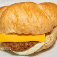 Sausage, Egg And Cheese Croissant · Finely chopped or ground meat often mixed with seasoning.