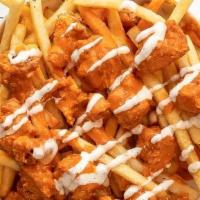 Buffalo Chik'N Fries · Diced chicken tenders, buffalo sauce, fries and drizzled ranch