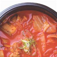 Kimchi Soup · Spicy Korean stew with kimchi and pork.