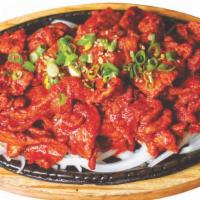 Pork Bulgogi · Pork meat marinated in spicy sauce.