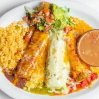 Enchiladas Tres Colores  · House Favorite! One cheese enchilada covered in mild enchilada sauce, one chicken enchilada ...