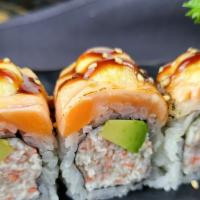 Baked Salmon Roll · (IN - Crabmeat, avocado) , 
(Out - Baked salmon, spicy mayo and eel sauce on top)