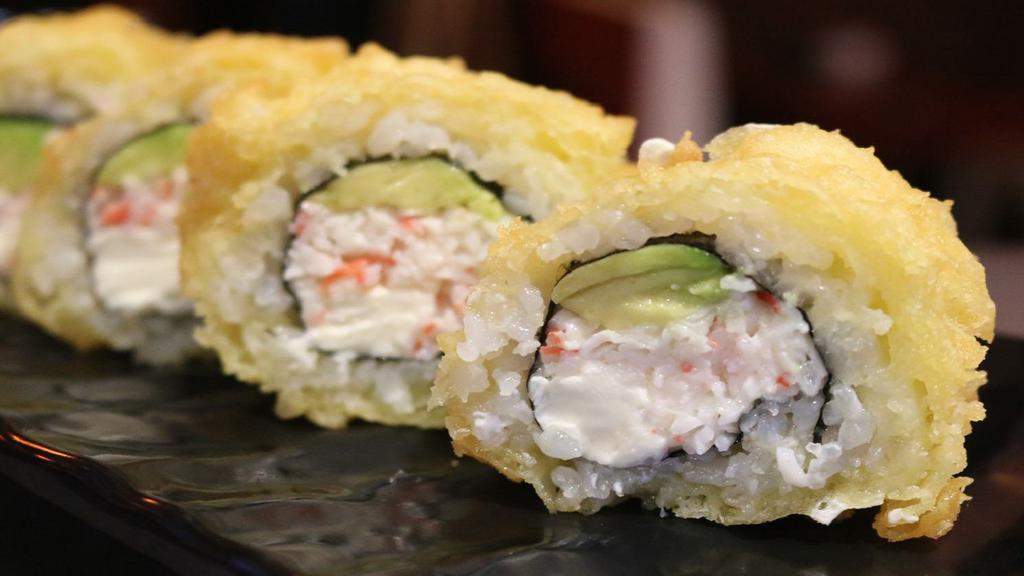 Crazy Boy Roll · Spicy. (IN - Crabmeat , avocado , cream cheese) ,  
(Out - Eel sauce on top)
