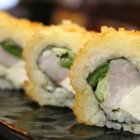 Tornado Roll · Spicy. (IN - Fresh  yellowtail , cream cheese and jalapenos deep fried) , 
(Out - Eel sauce ...