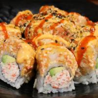 Music Crunch Roll · Spicy. Raw. (IN - Crabmeat, avocado) , 
(Out - Mixed crabmeat, spicy tuna, shrimp tempura an...