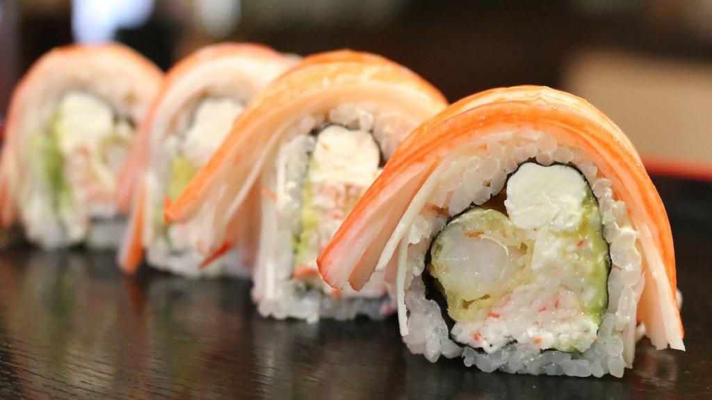 Temptation Roll · Spicy. (IN - Shrimp tempura, cream cheese, crabmeat, avocado) , 
(Out - Shredded crab stick and 4  sauces on top)