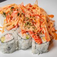 Crab Special Roll · (IN - Crabmeat, avocado) , 
(Out - Shredded marinated crab sticks and masago on top)
