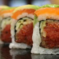 Sunset Roll · Spicy. Raw. (IN - Spicy tuna, cucumber) , 
(Out- Salmon and avocado on top)

Consuming raw o...