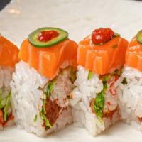 Rock N Roll · (IN - Spicy tuna, crabmeat, seaweed salad, avocado wrapped   in soy paper) ,  
(Out - Salmon...