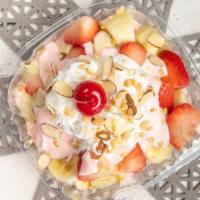 Pink Banana · Fresh banana, strawberries mixed with pink cream and topped with whipped cream, cherry, coco...