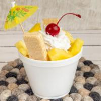 Coco Sundae · Two scoops of coconut ice cream, fresh pineapple, coconut wafers, whip cream, coconut flakes...