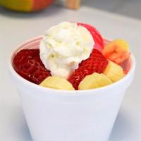 Fresa Banana Sundae · Two scoops of strawberry ice cream, fresh strawberry and banana, strawberry syrup and whip c...