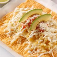 Chicharron · Mexican fried crisp, cabbage, cueritos (vinegar pork skins), tomato, avocado, Mexican cream,...