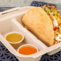 Fresco Crunchy  · Our one and only fresh Taco. Corn hardshell tortilla, your choice of protein, sour cream, ta...