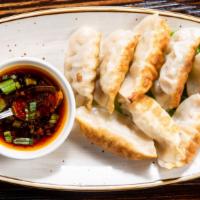Pot Stickers (8) · Pan fried or steamed pork dumplings with house special sauce.