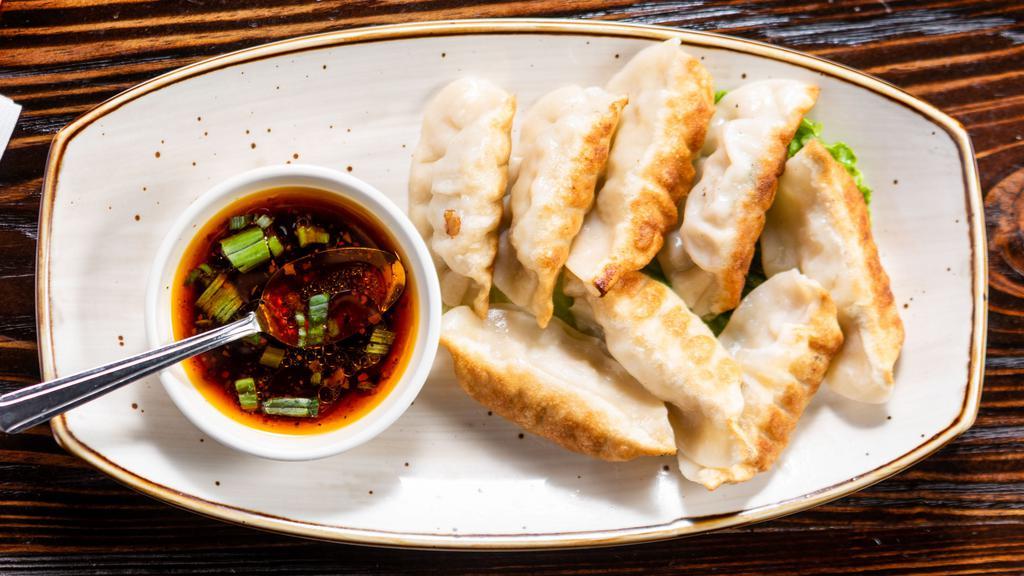 Pot Stickers (8) · Pan fried or steamed pork dumplings with house special sauce.