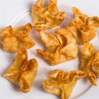 Crispy Crab Puffs · Crispy fried wonton with crab and cream cheese.