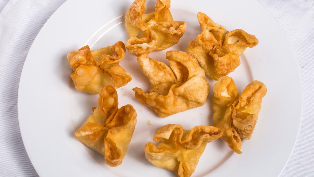Crispy Crab Puffs · Crispy fried wonton with crab and cream cheese.