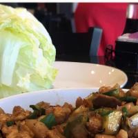 Chicken Lettuce Wrap · White meal chicken, mushroom, and water chestnut with wild garlic sauce.