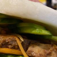 Bao With Pork · Braised Pork Belly, lettuce, carrot and cucumber in a steam Bun