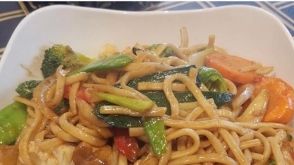 Vegetable Lo Mein · Soft noodle with assorted vegetables in a brown sauce.